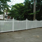 Weatherables Richmond white vinyl picket fence with a house and trees in the background