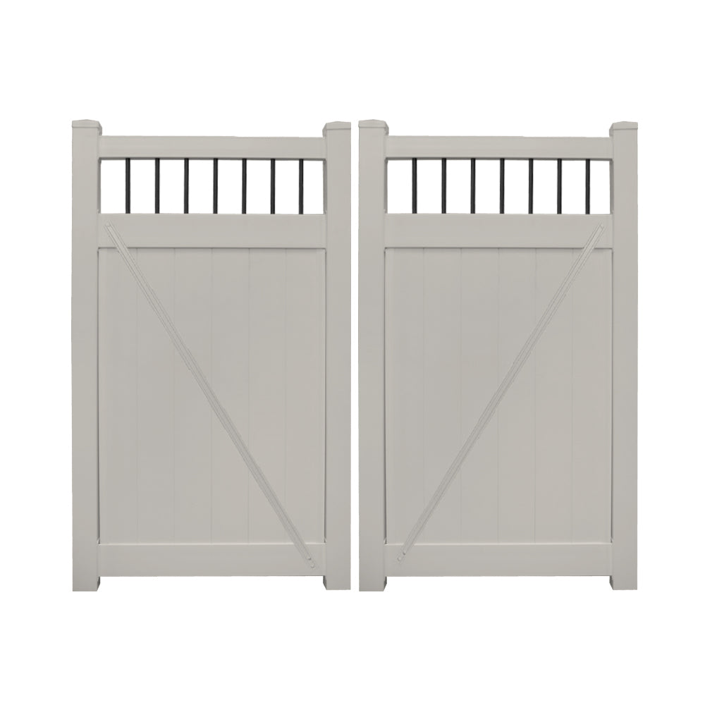 Tan Bradford vinyl privacy fencing double gate stock image