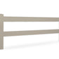 khaki vinyl 2-rail horse fence stock image