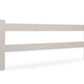 tan vinyl 2-rail horse fence stock image