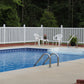 Pool area with white chairs, a table, and a Weatherables Sarasota white vinyl closed-top picket fence in the background