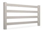 tan vinyl 4-rail horse fence stock image