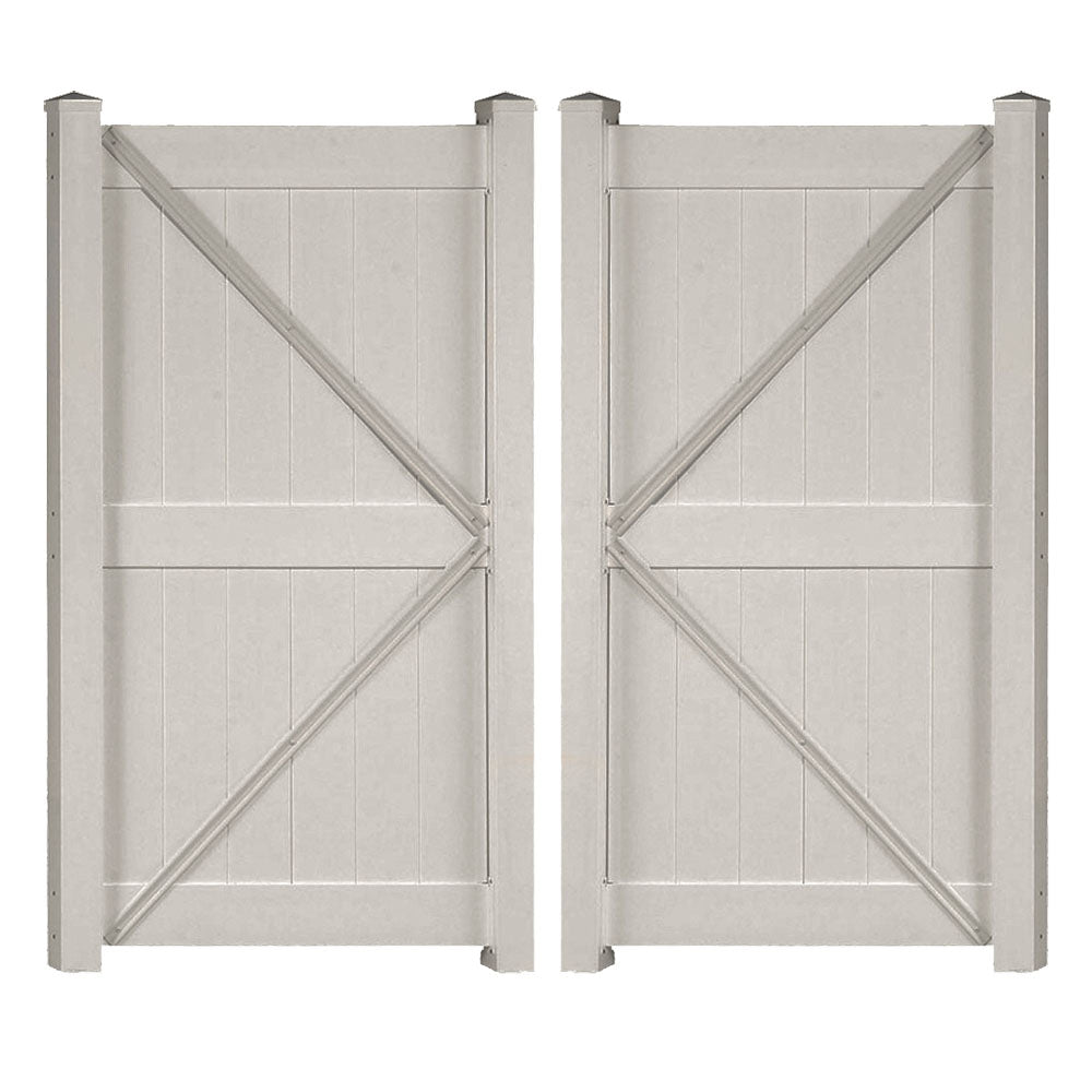 Tan Augusta vinyl privacy fencing double gate stock image