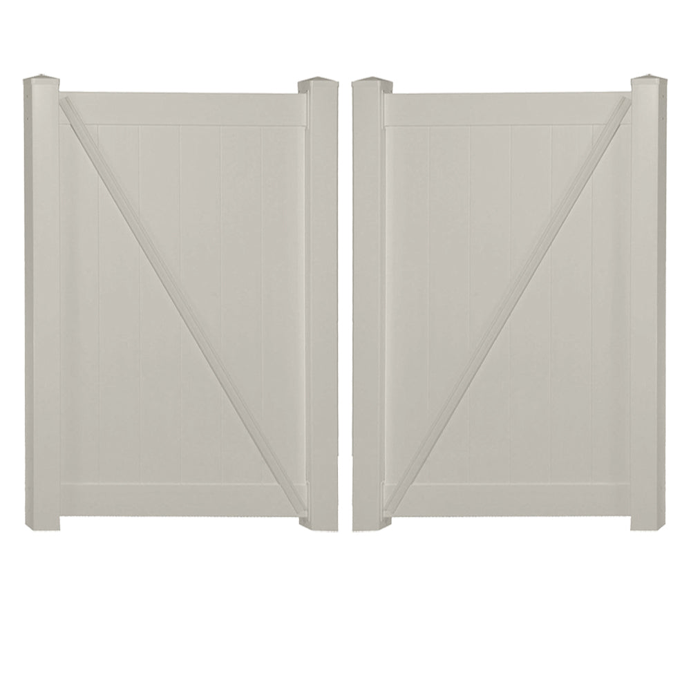 Tan Savannah vinyl privacy fencing double gate stock image