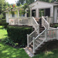 Home with a deck, Weatherables Washington tan vinyl deck railing and outdoor furniture on a sunny day