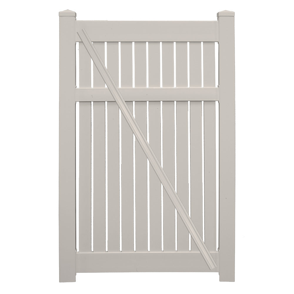 Tan Huntington vinyl semi-privacy fencing gate stock image