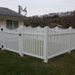 Weatherables Richmond white vinyl picket fence in front of a house with a cloudy sky