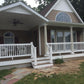 Two-story house with a brown porch, Weatherables Burlington white vinyl deck railing and brown siding