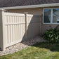 Weatherables Glendale tan vinyl semi-privacy fence and house exterior with greenery