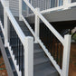 Staircase with Weatherables Bolton white vinyl stair railings on a building exterior